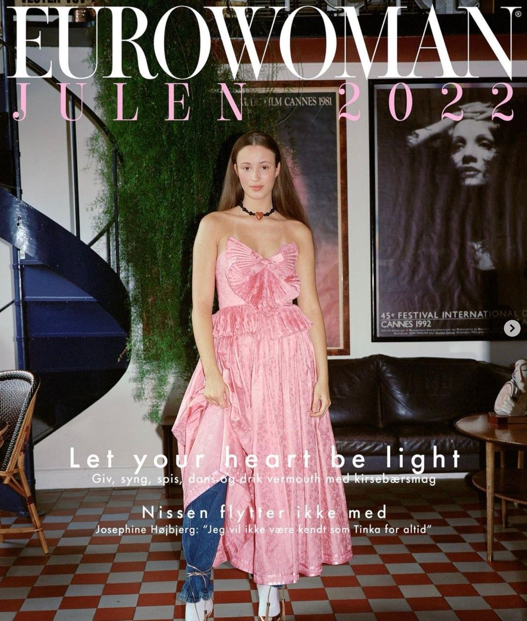 Josephine Højbjerg poses in a pink dress against a stylish indoor backdrop.